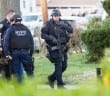 NYPD cop shot in head, suspect detained in manhunt