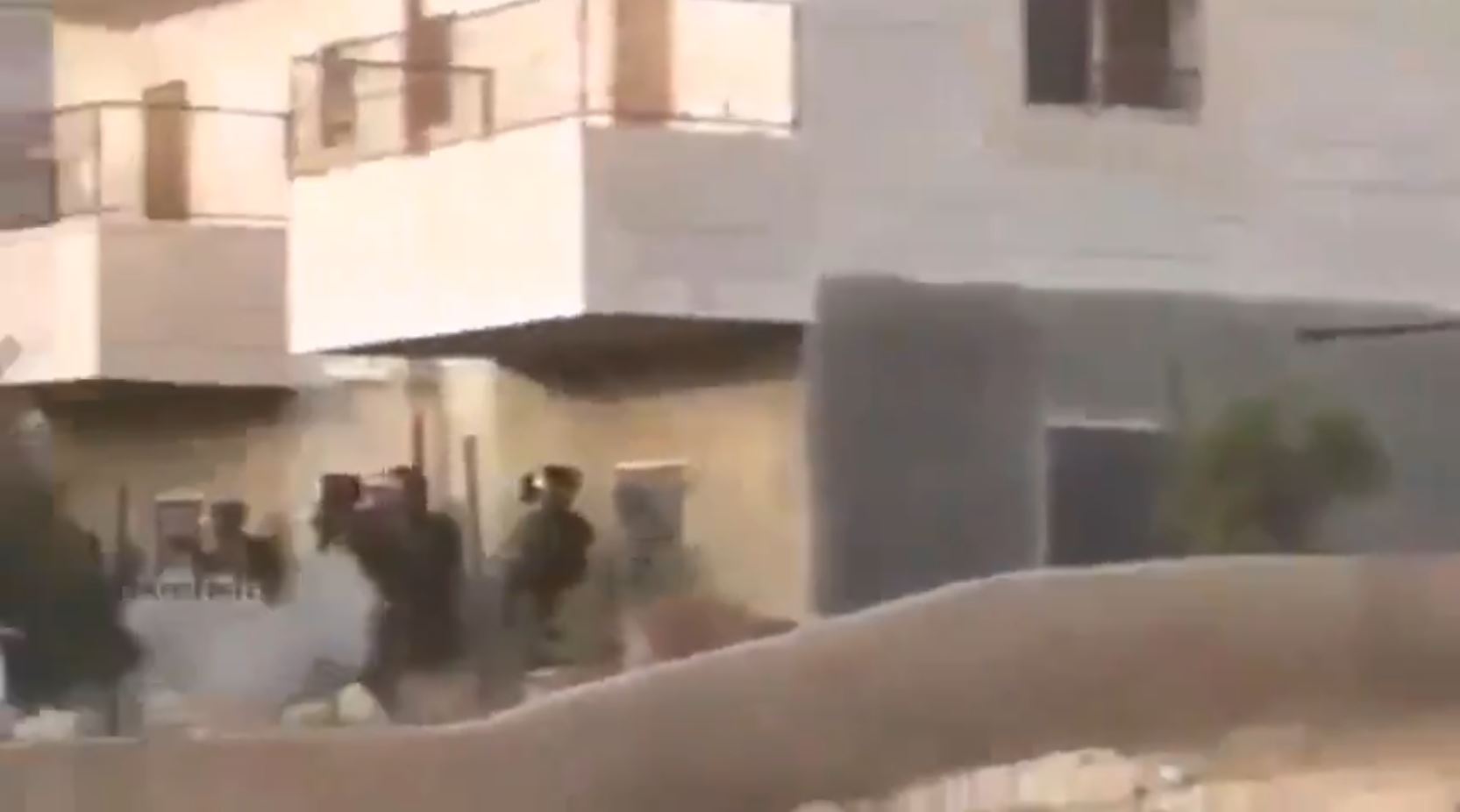 Pali Youth take tear gas box away from IDF and use it on them